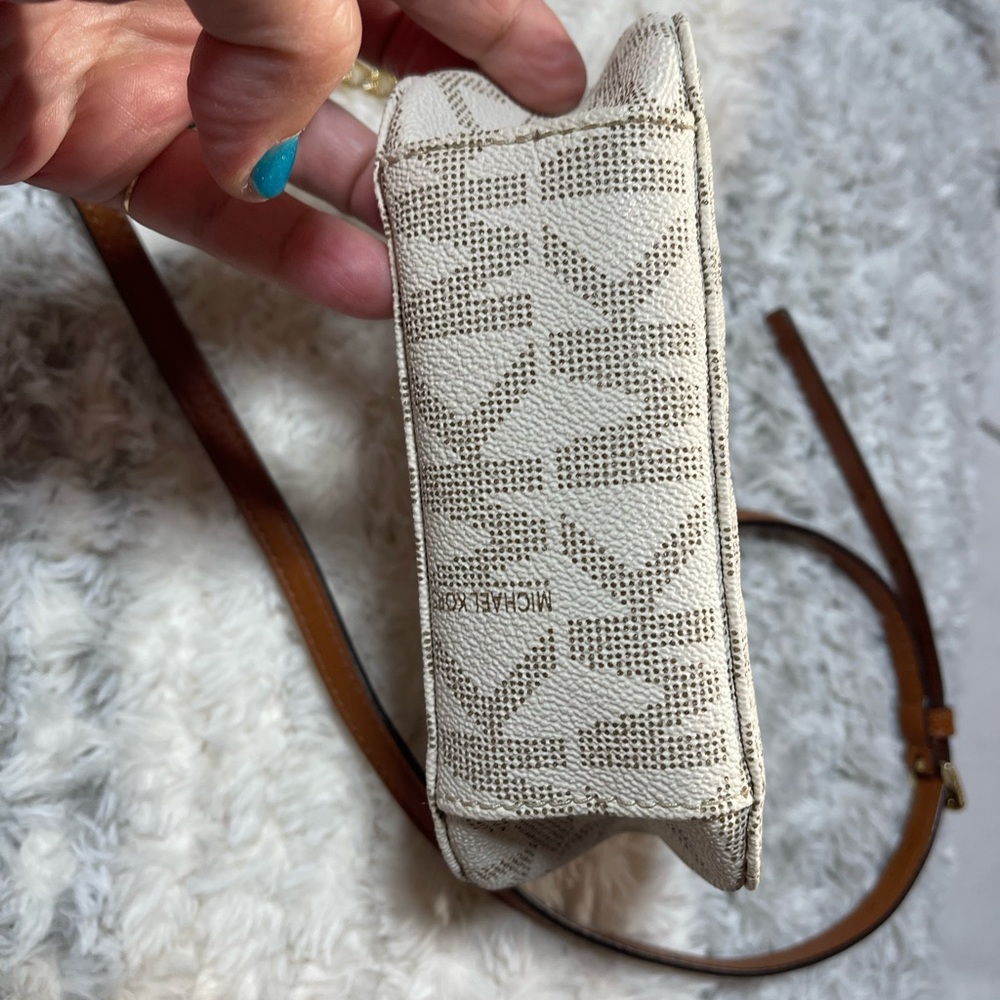 Michael Kors used cream with brown MK on it